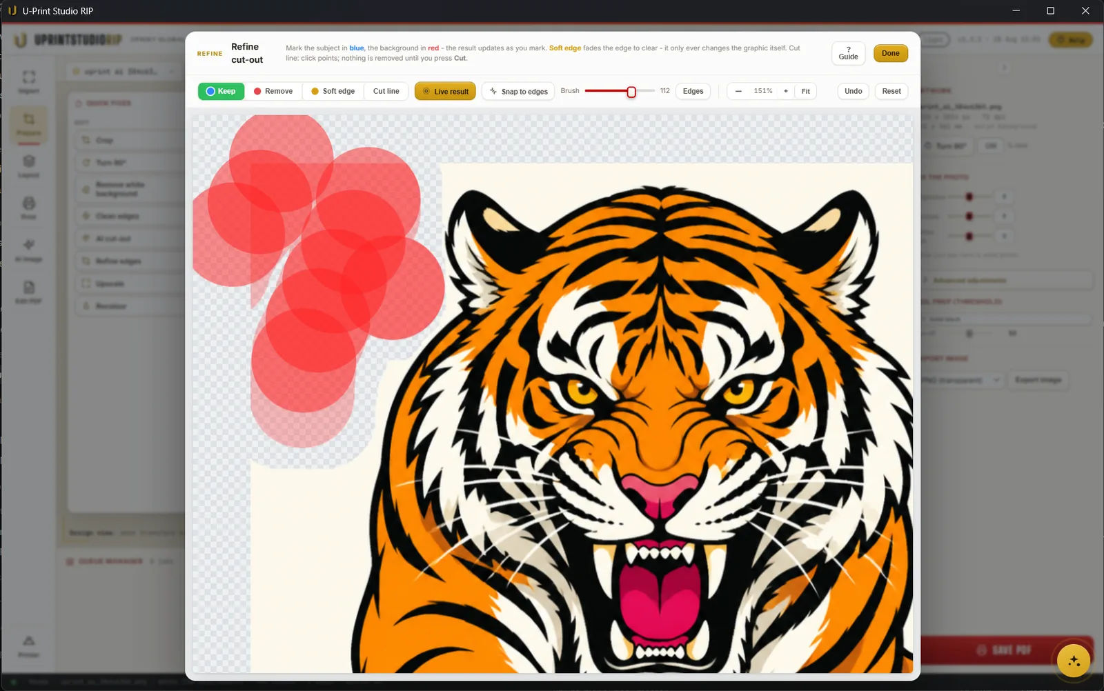 The Refine cut-out workspace open over a tiger illustration, with Keep, Remove, Soft edge and Cut line modes, a brush size slider, live result and snap to edges, and red brush strokes marking the background to be removed